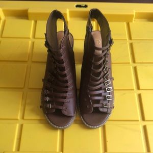 Brown peep toe and heel bootie